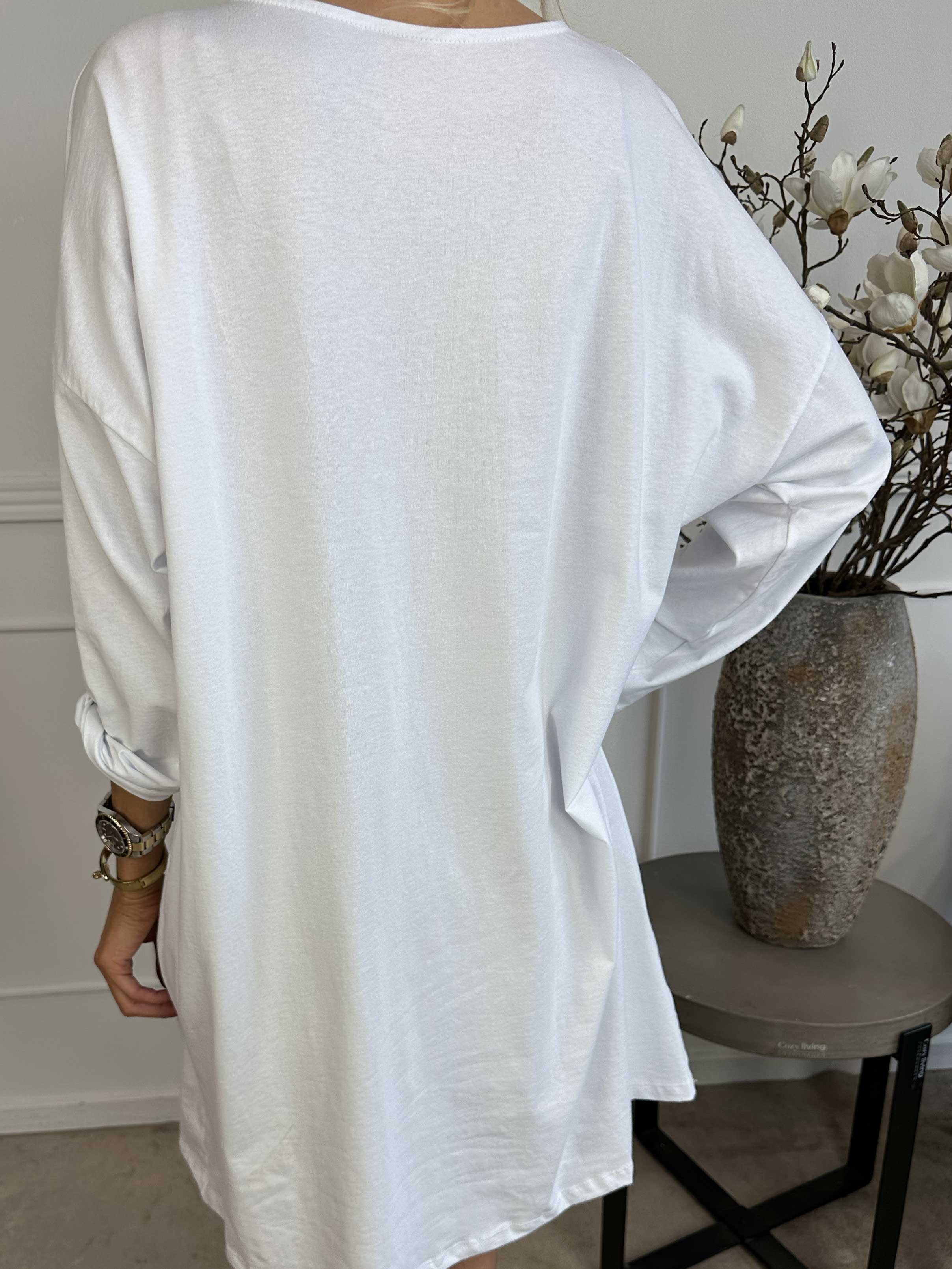 Susanna - Joggingklänning i bomull med färgade blommotiv